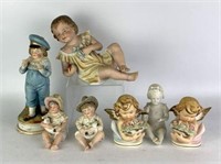 Porcelain Figurines Including Heubach Piano Babies