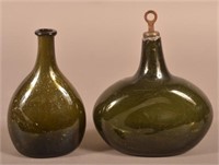 Two 18th C. Dark Emerald Green Blown Glass Bottles