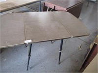 Bi fold Formica topped kitchen table