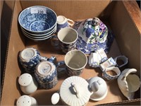 Blue splatter mugs, blue white bowls, napkin