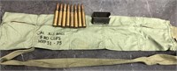 303 bandoleer with 8rnds of various stamps