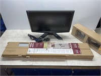 Computer monitor, light fixture, 2 boxes unused