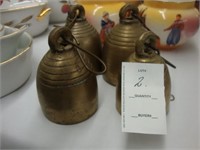 Lot of four old brass bells.