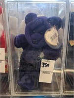 TY beanie baby purple bear with white rose in