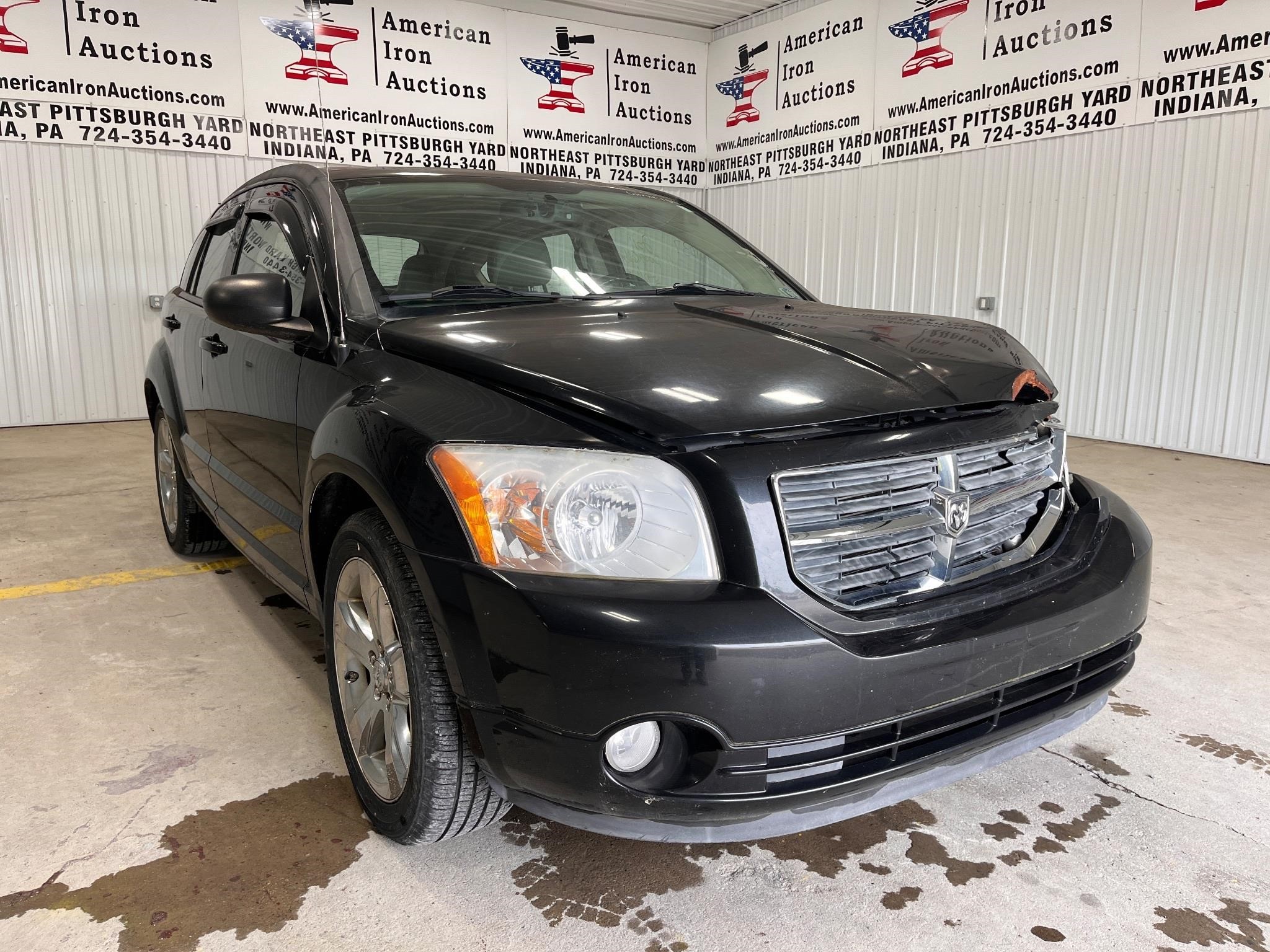 2011 Dodge Caliber Uptown Sedan CertificateSALVAGE