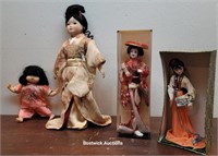 4 Asian dolls