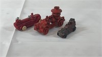 3 miniature cast iron fire trucks