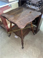 I hope parlor table with a glass claw feet