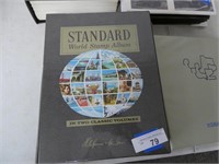 Standard world stamp album with some stamps
