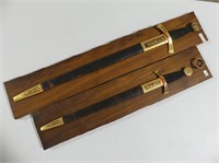 TWO DECORATIVE MOUNTED SWORDS