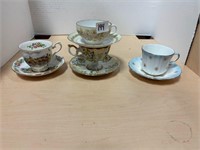 4 Teacups w/ saucers