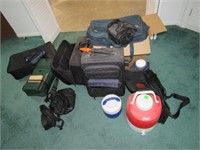 Assorted luggage, coolers, and more