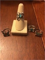 Lot of 4 unsigned sterling turquoise rings