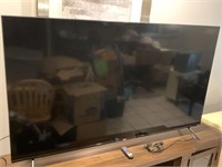 70" ROKU TV W/ REMOTE AND POWER CORD WORKS WELL