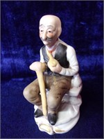 Porcelain Old Man and Old Lady Figurines