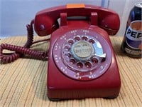 Vintage, red rotary desk phone