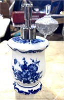 Blue and white soap dispenser