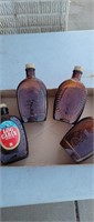 Lot of log cabin syrup bottles