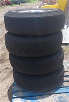 starfire 235/85/16 set tires and rims