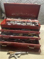 Toolbox full of miscellaneous tools, box