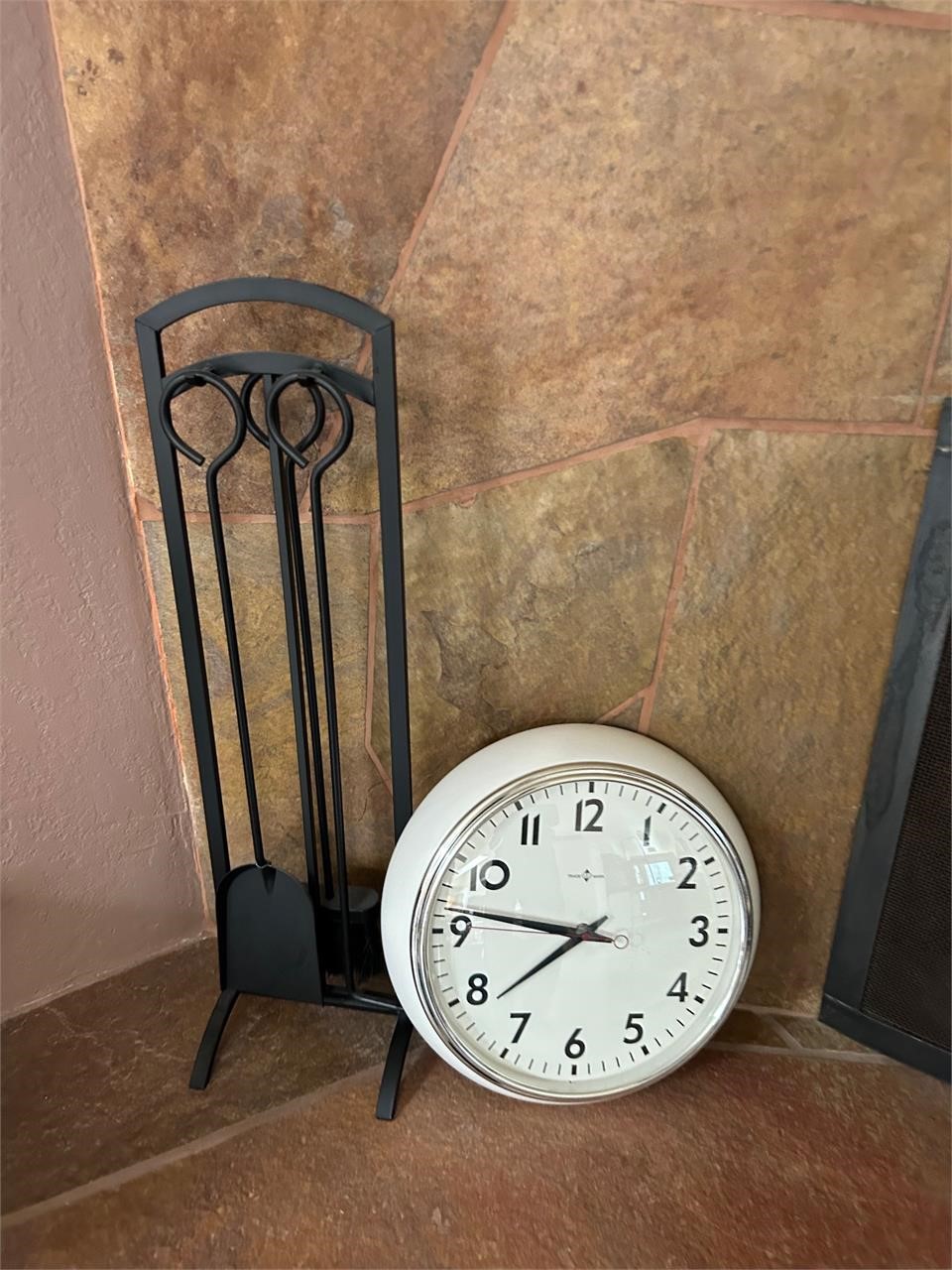 Fire Place Tools + Trade Mark Wall Clock