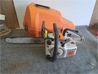 Stihl 009L chainsaw and case