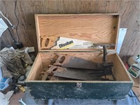 Trunk with 12 handsaws and saw vice
