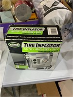 tire inflater in box.