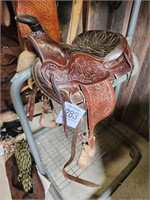 Older leather youth saddle 12" seat, good cond.