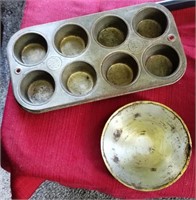 F10) Antique muffin pan &heavy metal candle holder