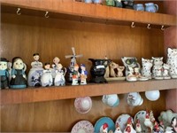 Shelf lot of Delft and cats found as is