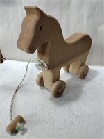 Wooden pull behind horse