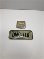 LICENSE PLATE AND VINTAGE CONTAINER