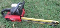 Homelite 240 gas chain saw. Note: Pulls free.