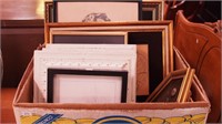 Box of framed items: tin ceiling tiles,