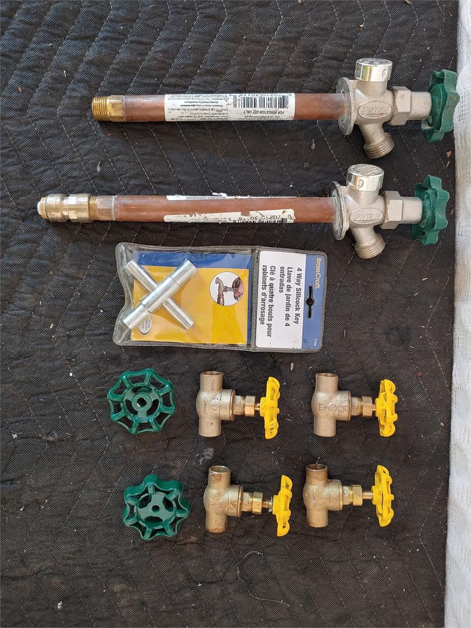 Assortment of brass hose/valve plumbing parts