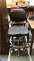 Vintage architects chair swivels with metal base,