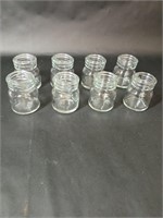 Eight Pressed Glass Ink Jars