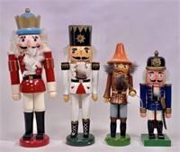 4 wooden nutcrackers - 10" to 15" tall
