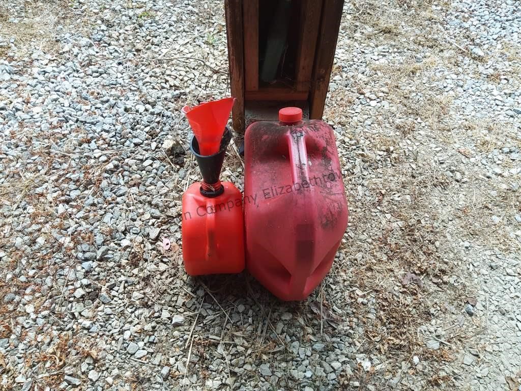 Two gas cans and funnel