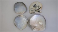 Four various vintage carved shells