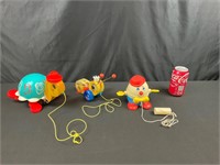 Three vintage Fisher-Price pull behind toys