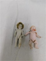 Pair of 2 3/4" bisque jointed baby dolls: Girl has
