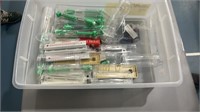 Plastic tub with contents (thermometers and