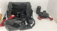 (2) Canon EOS A2 cameras with lenses and black