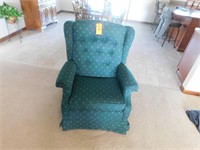 Lot 135  Green Swivel Rocker.