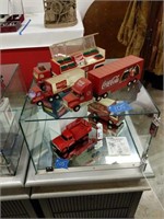 Group Of Coca-cola Toy Trucks As Shown