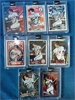 Mike Trout cards in thick hard cases. Part of a
