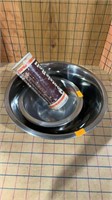 Stainless steel bowls and Tootsie Roll bank