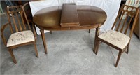 Dining room table w/ 3 leaves & 2 chairs